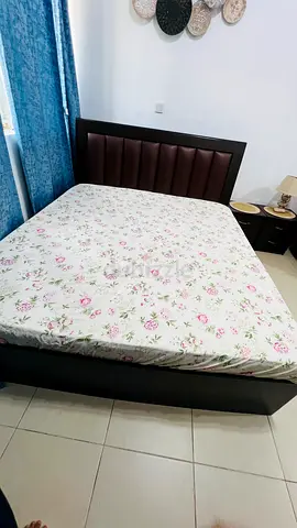 King size wooden bed frame with upholstered headboard with side table- good condition