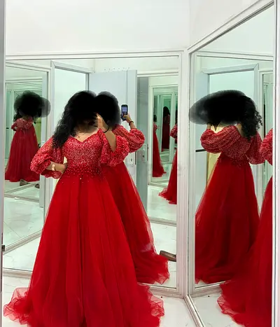 Brand new Gown for half price- Never used still in original packing
