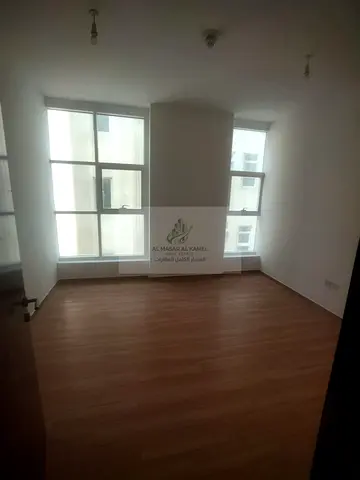 Spacious 2-Bedroom Apartment for Annual Rent in Al Majaz 3, Prime Location Near All Services, Free Gym, Swimming Pool & Parking