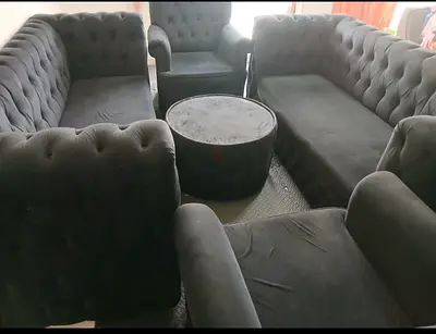 Black tufted 3-seater sofa set with armchairs and ottoman