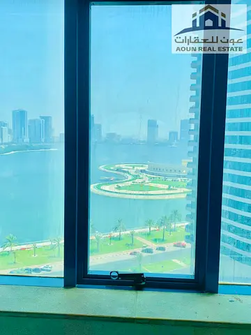For sale: 3-bedroom apartment with a living room (partitioned into 5 rooms) in Al-Manna Tower. Asking price: AED 900,000. Includes two parking spaces.