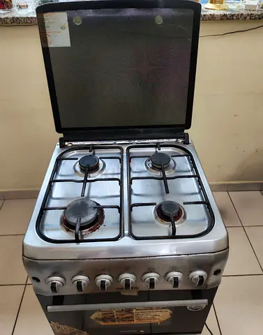 Used 4-Burner Gas Stove with Oven - Good Working Condition