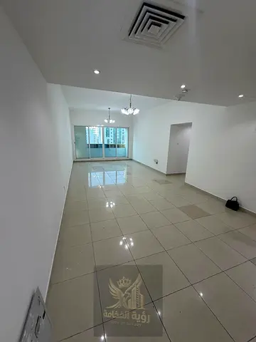 The Cheapest 2 Bedroom Apartment for Annual Rent in Al Majaz 2 on Jamal Abdul Nasser Street with AC on Landlord Built-in Wardrobes and Balcony