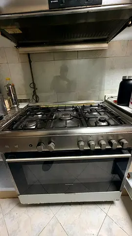 Used freestanding gas cooker with oven - 5 burners, stainless steel