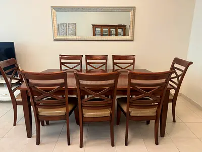Solid wood 8-seater dining table set with chairs and buffet - good condition