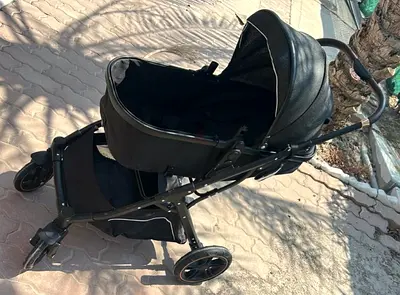 Black full-size baby stroller/pram with bassinet