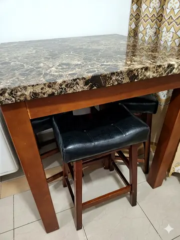Marble sticker finish top dining table with 4 padded stools - good condition