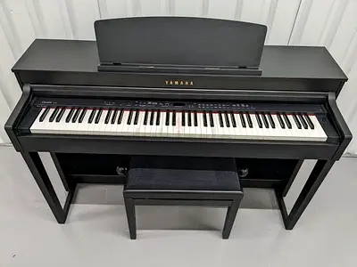 Yamaha Clavinova CLP440.  Piano in very good condition. With matching piano bench. COD with warranty