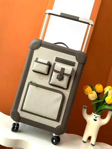Hermes Compact canvas roller luggage with front pockets (SUPER MASTER QUALITY)
