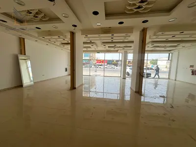محل تجاري مع ميزانين على شارع الشيخ عمار مباشر