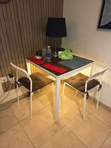 ** IKEA ** 2-seater table with 2 chairs and cushions