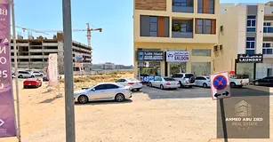 Residential Commercial Land for Sale in Al Amerah Ajman Directly on the Main Road 4,517 Sq Ft G+2 Pe