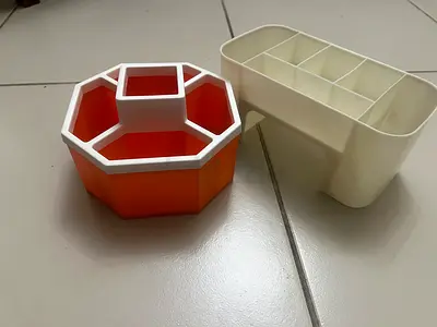 orange plastic tabletop holder and stationery organizer