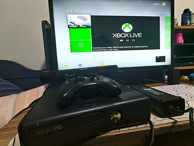 Xbox 360 Slim console bundle with controller and power brick - working