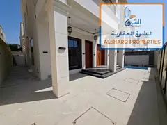 Villa featuring 5 master bedrooms, a maid's room, a large living area, a majlis, a private pool, a r