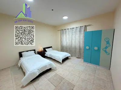 A luxurious, fully furnished two-bedroom apartment with a living room, featuring high-end, brand-new furnishings and a prime location.