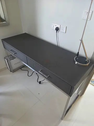 Modern grey study desk with drawers and metal legs