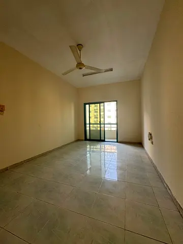 Two bedrooms and a living room for annual rent in Al Qasimia, Sharjah, with a balcony. Spacious and close to all services. Flexible payment options up