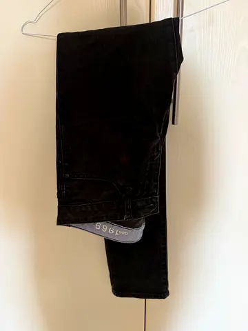 Black slim-fit jeans, gently used