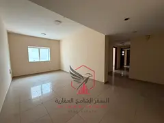 Lowest price two bedroom apartment with a living room with free parking and a master bedroom