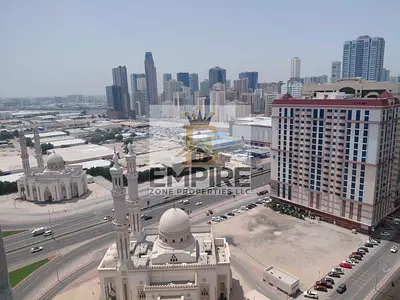 SPACIOUS BRIGHT APPARTMENT// EASY PAYMENT // FAMILY BULIDING // EASY CLOSE EXIT TO DUBAI
