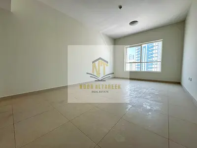 Modern 2BR Apartment with Free Parking in Al Taawun