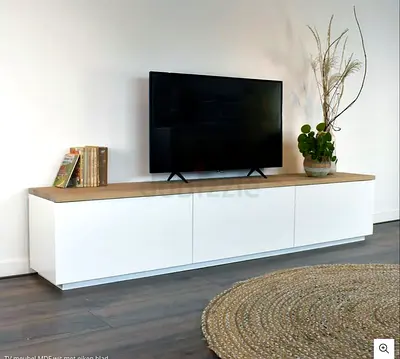 Long white TV cabinet with oak top - modern low entertainment unit