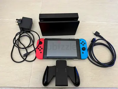 Nintendo Switch console 1st Generation Version 2 (2020) + 1 joy-con controller with charger grip