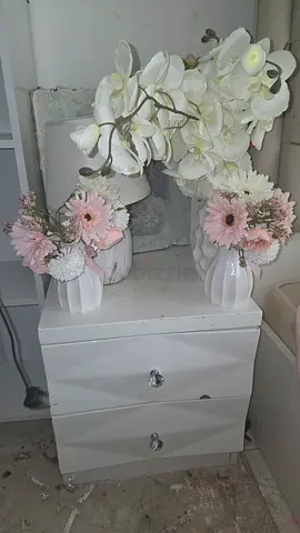 White vase with flowers