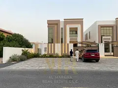 Villa for sale in Al Muwaihat 3 - Ajman | 5 master bedrooms | 2 living rooms | Spacious courtyard | 