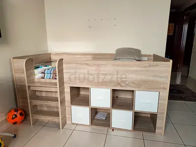 Wooden loft single bed with storage cubbies and stairs - good condition