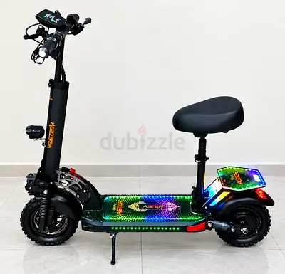 Foldable electric scooter with seat and LED lights - good condition