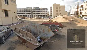 Commercial residential land for sale in Al Alia, Ajman, in a prime location near the main road and s