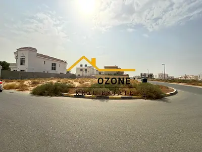 Corner land for sale in Al Houshi