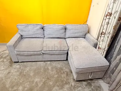 Light grey L-shaped 3-seater Sofa cum Bed and Storage - Home box (good condition)