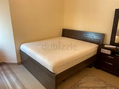 Queen wooden bed frame with mattress and storage drawers - good condition