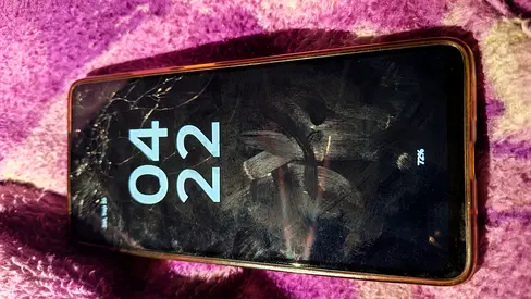 Used smartphone with cracked screen But working properly. Talabat Root.