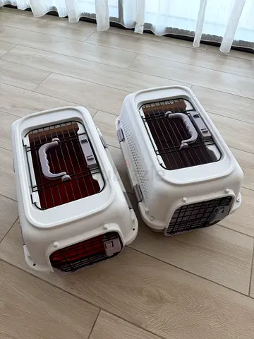 Two small plastic pet carriers with metal doors - excellent condition