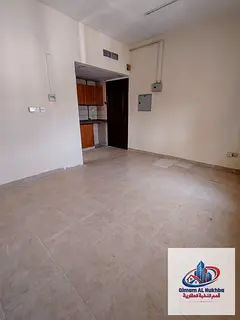 Studio for Annual Rent in Al Ghuwair Sharjah with Separate Kitchen, Kitchen Cabinets, Central AC and