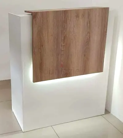 Reception counter with wood front panel and LED lighting