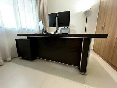 Modern executive office desk with under-drawers and cable management