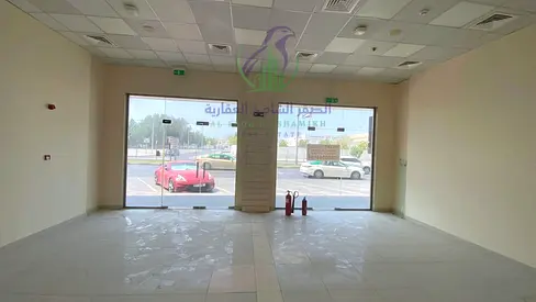 Commercial shop available for rent in Al Majaz 3, located on Al Khalidiya Street in a prime first-row position directly on the main road