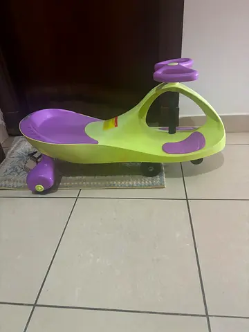 PlasmaCar-style Ride-On Toy for Toddlers - Green/Purple