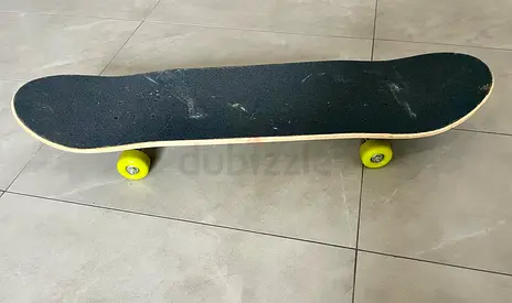 Used Complete Skateboard with Lime-coloured wheels - Good Condition