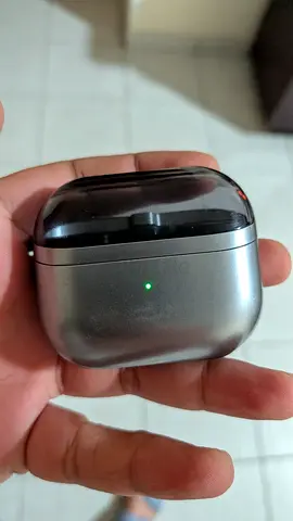 Used true wireless earbuds with charging case (compact, metallic finish). No buds inside, Only Case.