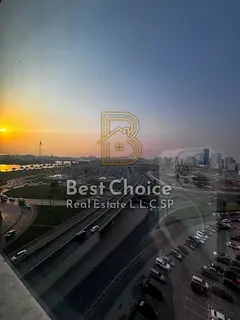 An elegant office is available for annual rent in Al Majaz 1, featuring a glass frontage, water view