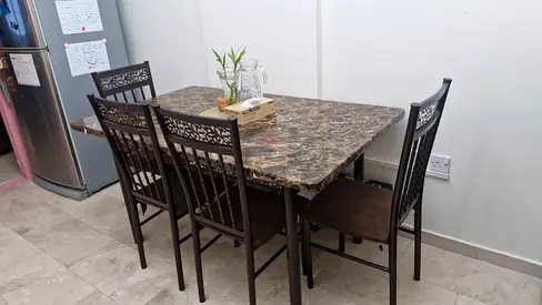 4-seater dining table with matching chairs - good condition