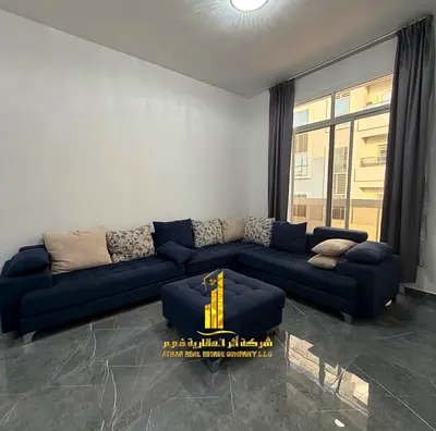 Luxurious one-bedroom apartment with brand new furnishings for monthly rent in Ajman - Al Rashidiya 2 - behind the Ruler's Palace