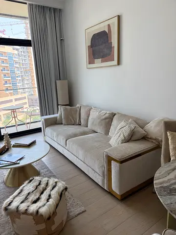 Light beige sofa with cushions - excellent condition like new