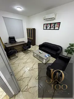 A fully fitted commercial office is available for annual rent in Al Jurf 3, Ajman, located next to t